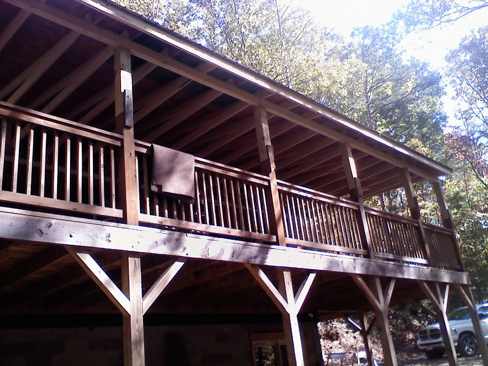 Timber framing under a new elevated porch and deck — Roof Leak Repair in Stafford Springs by Roofing Brothers